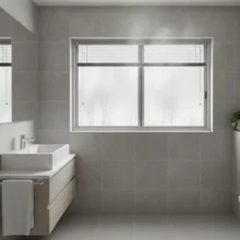 Vochtbestendige aluminium jaloezieën in een strakke, moderne badkamer, wat de geschiktheid voor vochtige ruimtes toont.